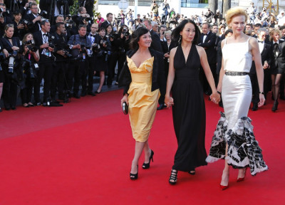 Jury members of the 66th Cannes Film Festival actress Nicole Kidman R, directors Naomi Kawase C and Lynne Ramsay L pose on the red carpet as they arrive for the screening of the film La Venus a la Fourrure Venus in Fur in competition d