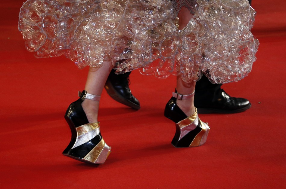 The shoes of a guest are pictured as she walks on the red carpet arriving for the screening of the film La Vie DAdele in competition during the 66th Cannes Film Festival in Cannes May 23, 2013.