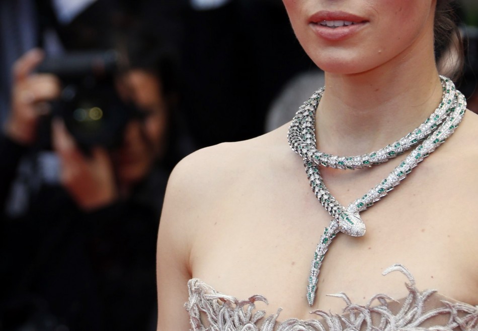 Actress Jessica Biels necklace is pictured as she poses on the red carpet arriving for the screening of the film Inside Llewyn Davis in competition during the 66th Cannes Film Festival in Cannes May 19, 2013.