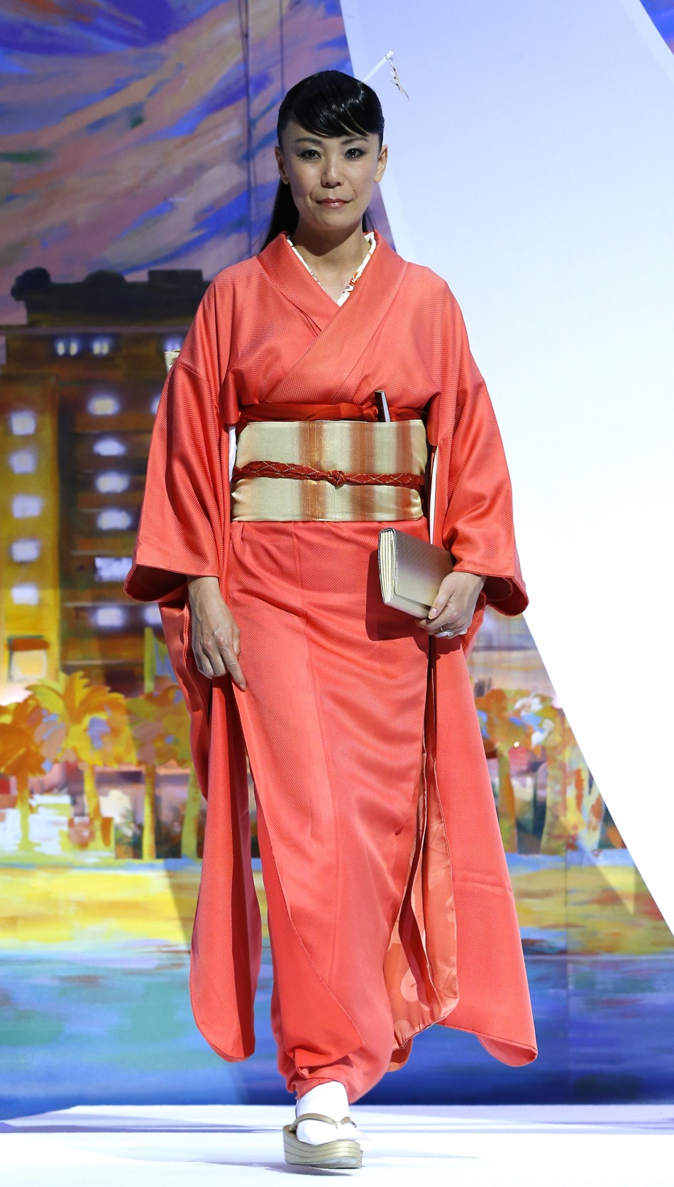 director Naomi Kawase arrives on stage during the closing ceremony of the 66th Cannes Film Festival in Cannes May 26, 2013.