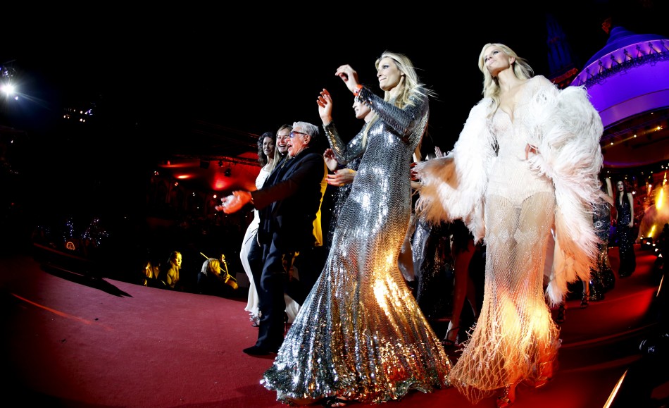 Italian fashion designer Roberto Cavalli C arrives with models for the opening ceremony of the 21st Life Ball in Vienna