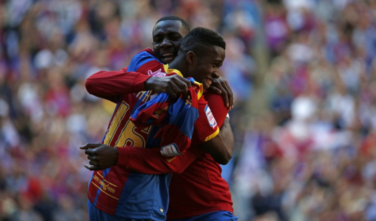 Zaha celebrates in yesterday's play off victory. (Reuters)
