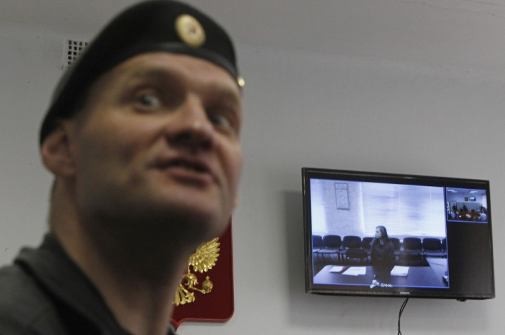 Jailed Pussy Riot punk rock group member Maria Alyokhina is seen on a monitor, as she takes part in a video conference from the penal colony