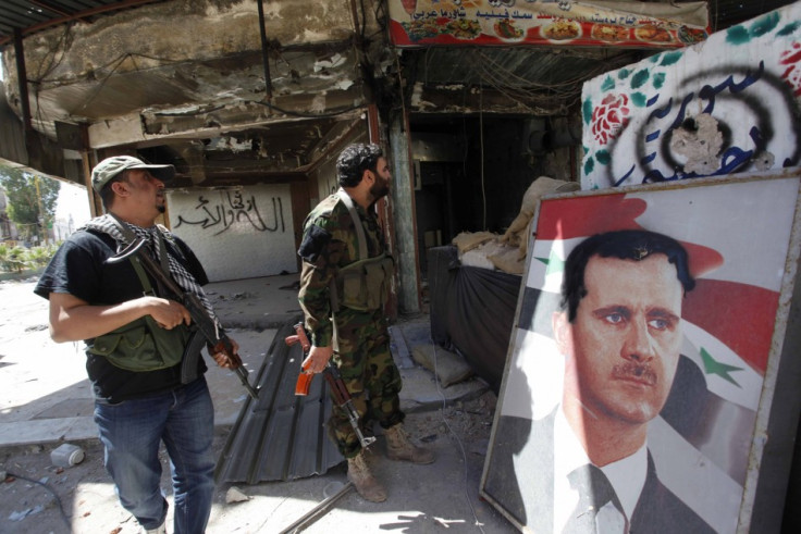 Security personnel loyal to Syria's President Bashar al-Assad