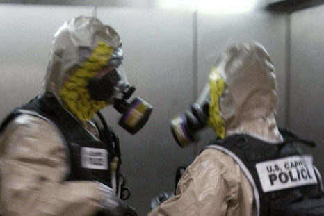 Officers wear protective gear to handle suspect packages in Washington