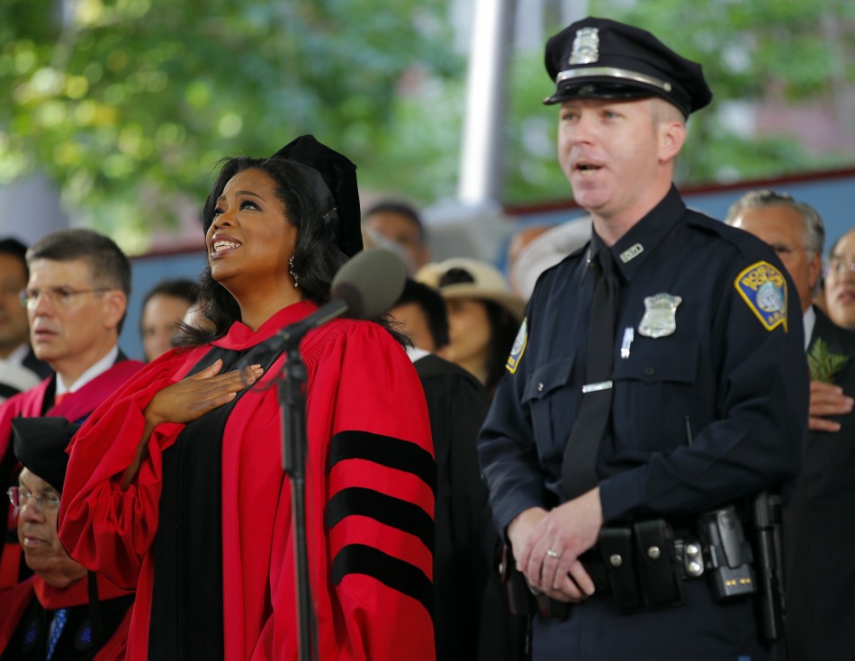 Oprah Winfrey stands for the United States national anthem during Harvard Universitys 362nd Commencement ceremony in Cambridge, Massachusetts