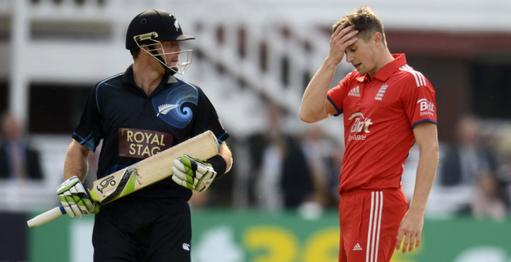 Martin Guptill (L) and Chris Woakes