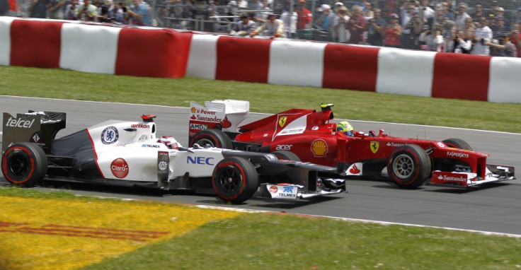 Kamui Kobayashi [Sauber] and Felipe Massa [Ferrari]