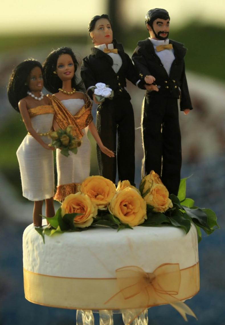 Cake decorations are seen on a cake during a symbolic group wedding on Valentine's Day in Lima Feb. 14, 2012 The wedding was organized by the local gay community to create a discussion about the illegality of gay marriages in Peru.