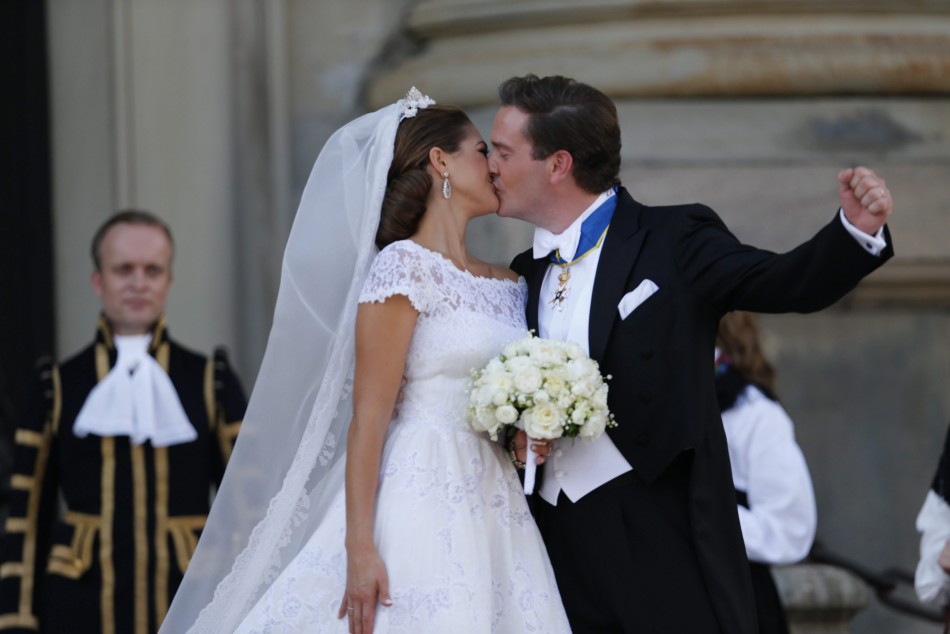 Swedens Princess Madeleine kisses U.S.-British banker Christopher ONeill outside the royal church after their wedding ceremony in the royal castle in Stockholm