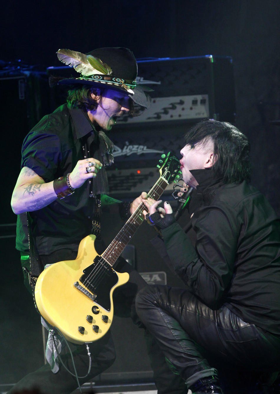 Johnny Depp L performs with musician Marilyn Manson at the 4th annual Golden Gods awards at Nokia theatre in Los Angeles, California April 11, 2012.