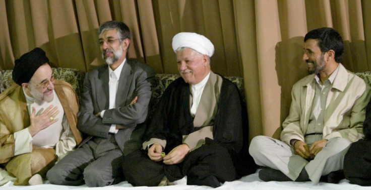 ran's former president Mohammad Khatami (L) greets President Mahmoud Ahmadinejad (R) as Akbar Hashemi Rafsanjani (2nd R) and Ghomali Haddad Adel smile during a meeting with Iran's Supreme Leader Ayatollah Ali Khamenei