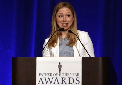 Chelsea Clinton introduces Bill Clinton as Father of the Year. Chelsea Clinton introduces Bill Clinton as Father of the Year.