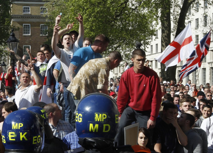 EDL demonstrators shout during a protest in Whitehall, organised following the recent killing of British soldier Lee Rigby (Reuters)