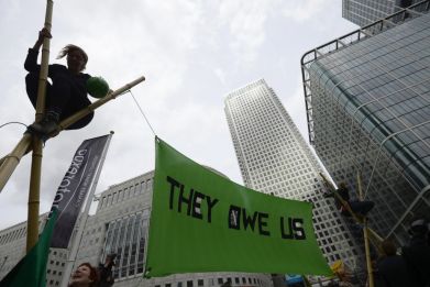 They Owe Us Canary Wharf protest
