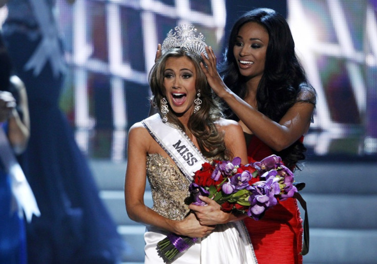 Miss Connecticut Erin Brady reacts as she is crowned by Miss USA 2012 Nana Meriwether during the Miss USA pageant at the Planet Hollywood Resort and Casino in Las Vegas, Nevada June 16, 2013.
