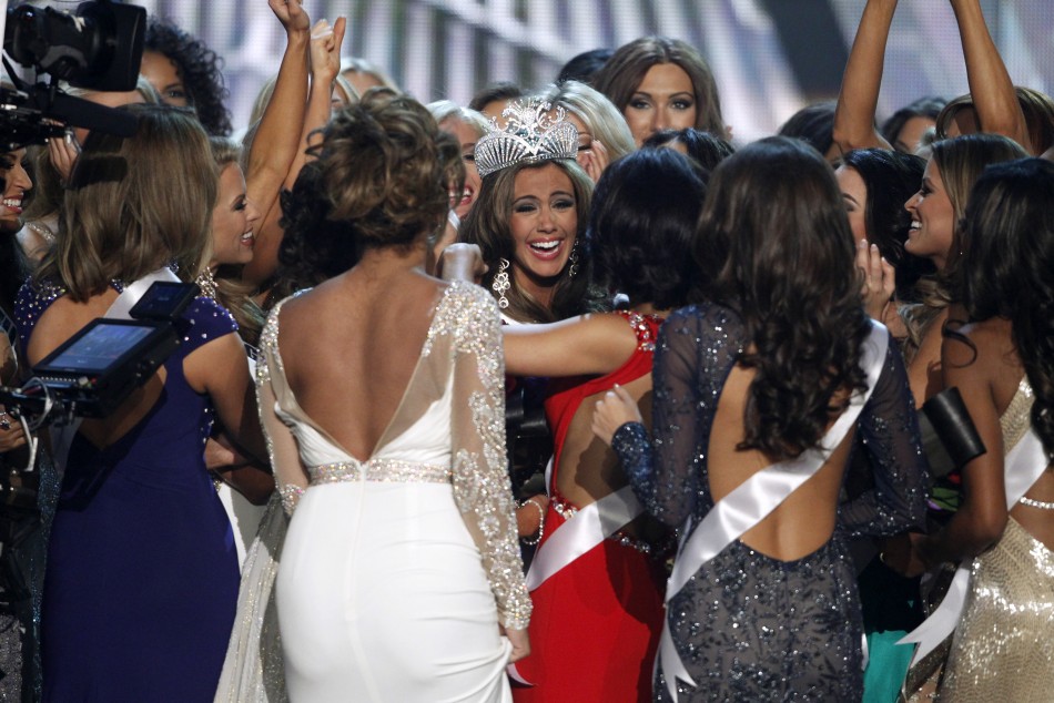 Miss Connecticut Erin Brady C is congratulated by other contestants after being crowned during the Miss USA pageant at the Planet Hollywood Resort and Casino in Las Vegas, Nevada June 16, 2013.