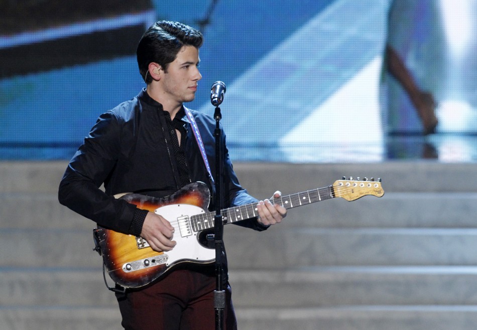 Nick Jonas of the Jonas Brothers performs during the Miss USA pageant at the Planet Hollywood Resort and Casino in Las Vegas, Nevada June 16, 2013.