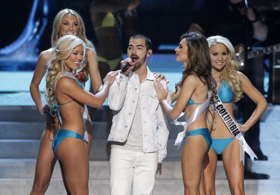 Joe Jonas C of the Jonas Brothers performs during the Miss USA pageant at the Planet Hollywood Resort and Casino in Las Vegas, Nevada June 16, 2013.