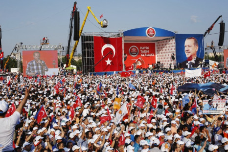 Turkish Prime Minister Tayyip Erdogan addresses his supporters during a rally by his ruling AK Party in Istanbul
