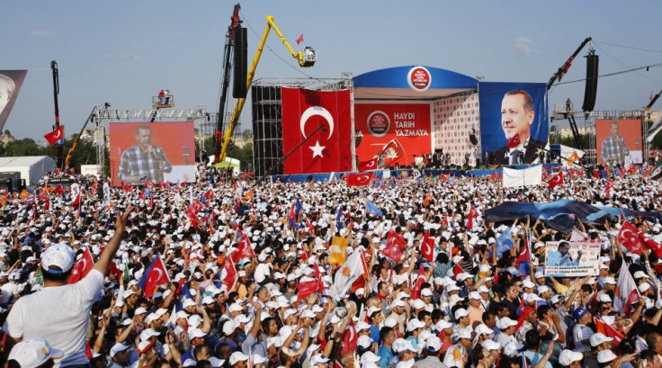 Turkish Prime Minister Tayyip Erdogan addresses his supporters during a rally by his ruling AK Party in Istanbul