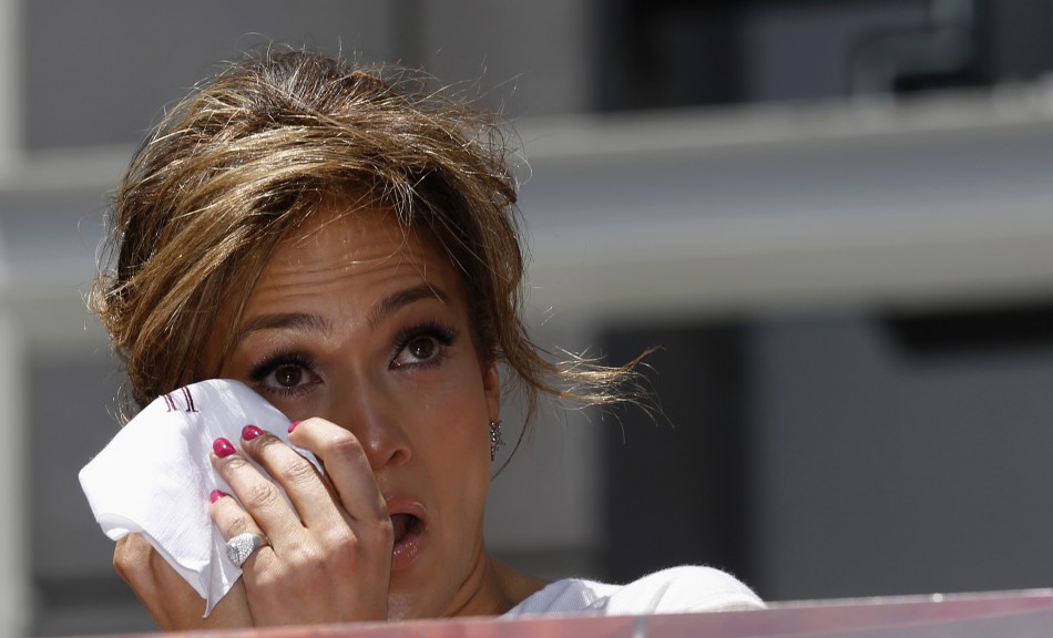 Lopez gets emotional before unveiling her star