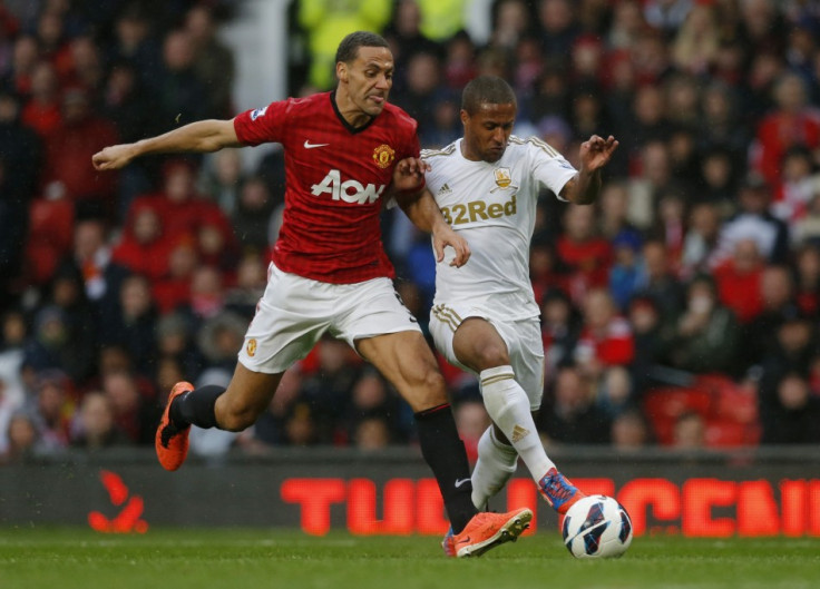 Rio Ferdinand (L)