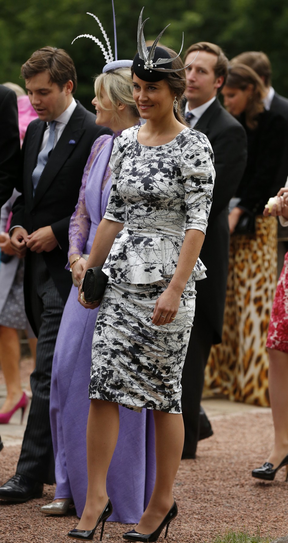 Pippa Middleton, the sister of Catherine, Duchess of Cambridge smiles as she leaves the wedding