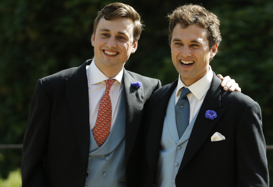 Groom Thomas van Straubenzee R smiles as he stands with his brother Charlie