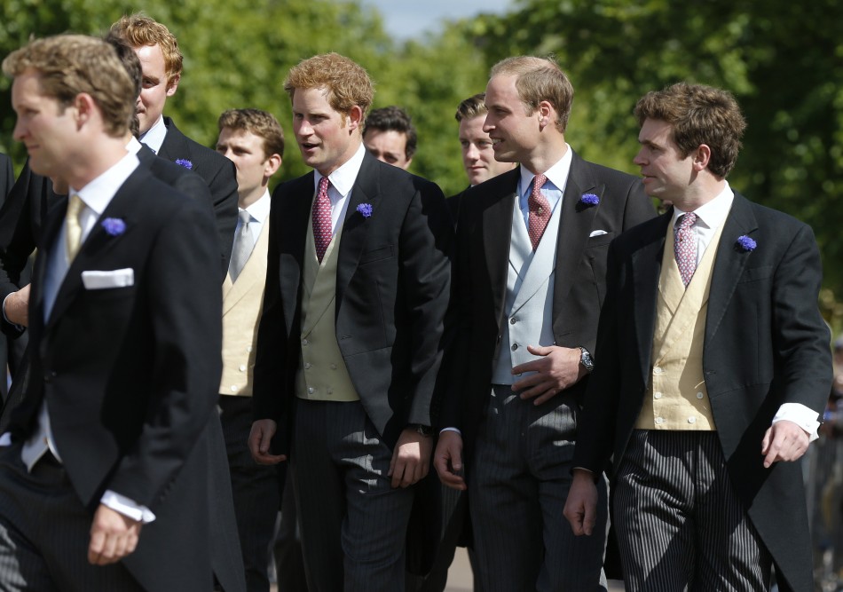 Prince William 2nd R and Prince Harry C arrive for the wedding