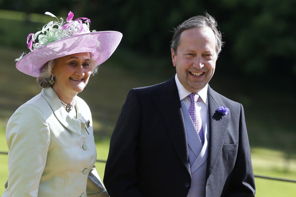 Alexander and Claire van Straubenzee smile as they arrive for the wedding of their son Thomas to Melissa Percy, daughter of Ralph and Jane Percy, the Duke and Duchess of Northumberland