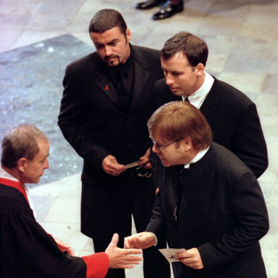 Michael (top), Elton John (R) and David Furnish (C) at the funeral service for Diana, Princess of Wales at Westminster Abbey, September 6,1997