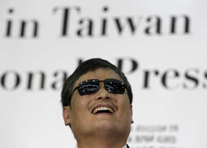 Chinese dissident Chen Guangcheng laughs during a news conference in Taipei Chinese dissident Chen Guangcheng laughs during a news conference in Taipei