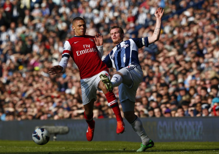 Kieran Gibbs (L) and Chris Brunt