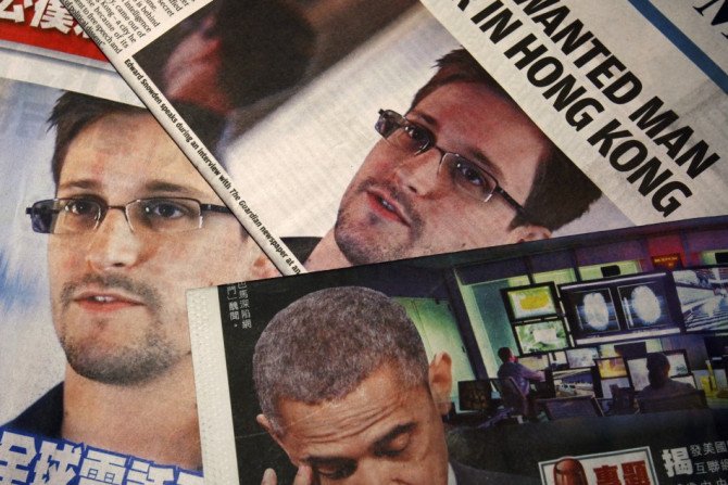 Photos of Edward Snowden, a contractor at the National Security Agency (NSA), and U.S. President Barack Obama are printed on the front pages of local English and Chinese newspapers in Hong Kong