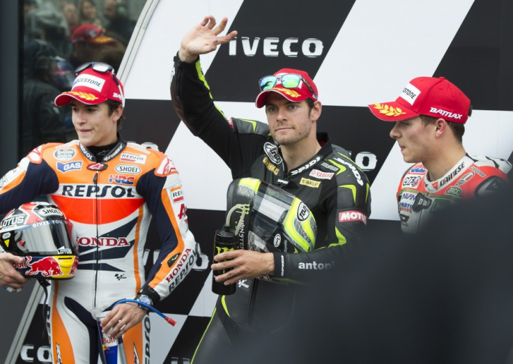 Crutchlow flanked by Marquez (L) and Bradl