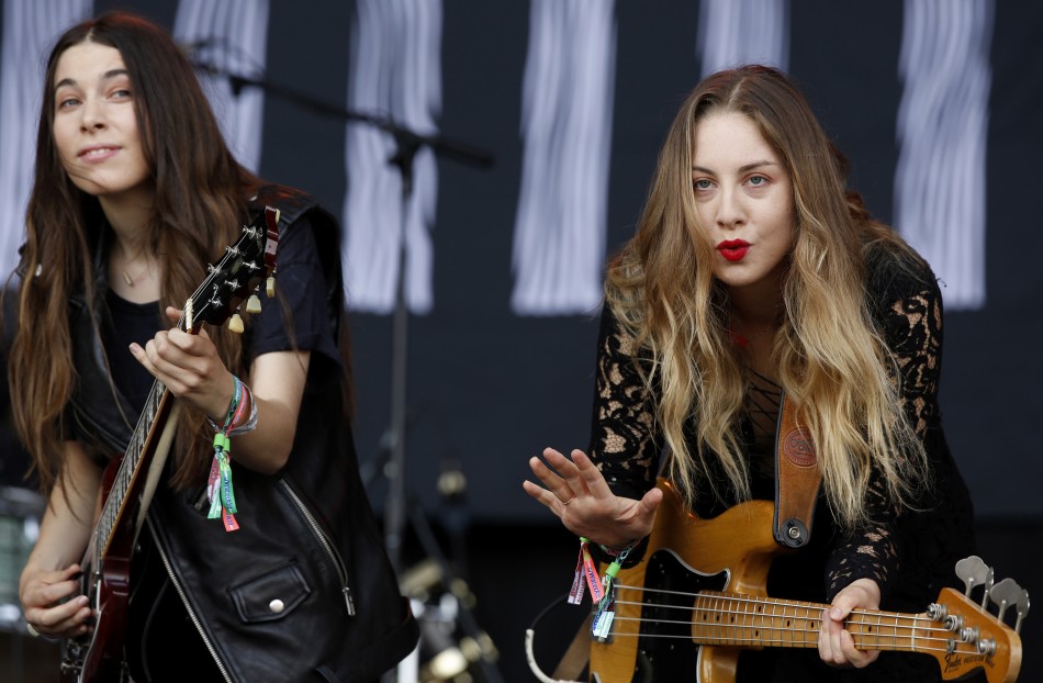 Danielle and Este Haim from all-sister Californian band Haim perform at the Pyramid stage during the Glastonbury music festival at Worthy Farm in Somerset, June 28, 2013.