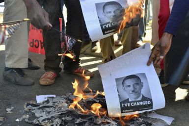 Protesters at University of Johannesburg burn images of Barak Obama