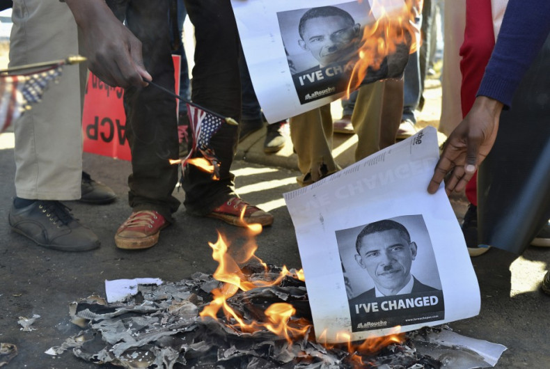 Protesters at University of Johannesburg burn images of Barak Obama
