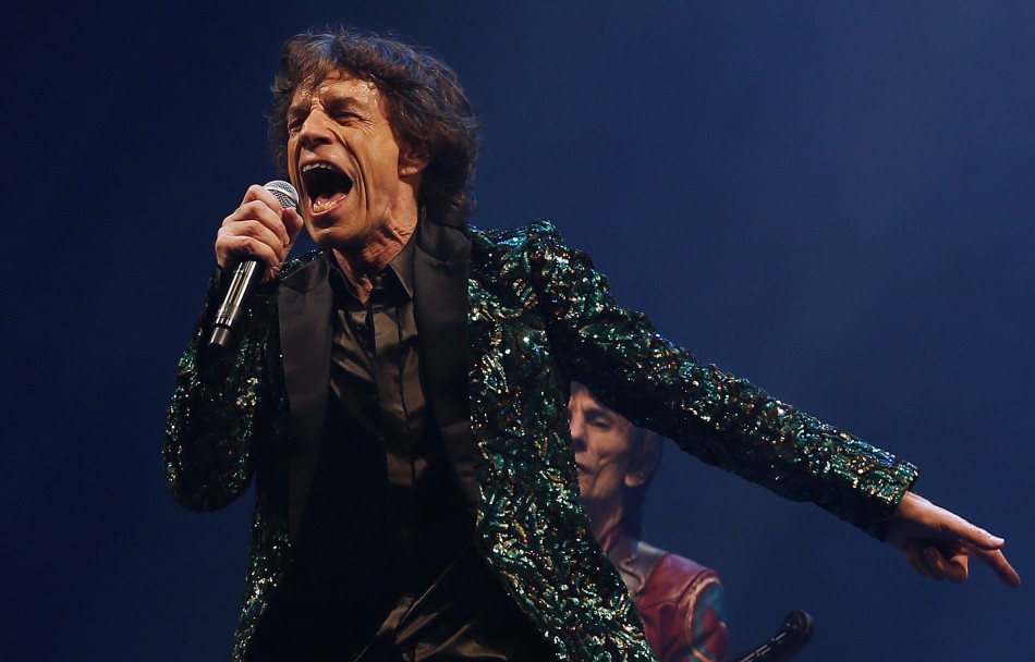Lead singer of the Rolling Stones Mick Jagger performs on the Pyramid Stage at Glastonbury music festival at Worthy Farm in Somerset, June 29, 2013.