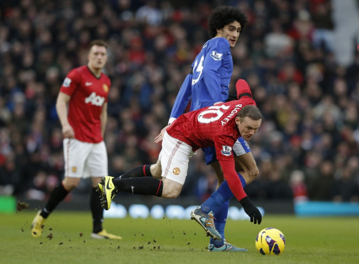 Wayne Rooney (L) and Marouane Fellaini