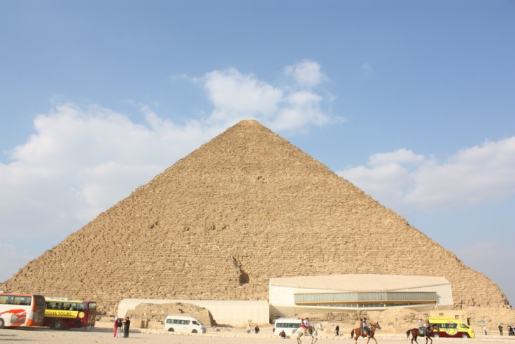 Great Pyramid of Giza from south showing the Solar boat museum (Wiki Commons)