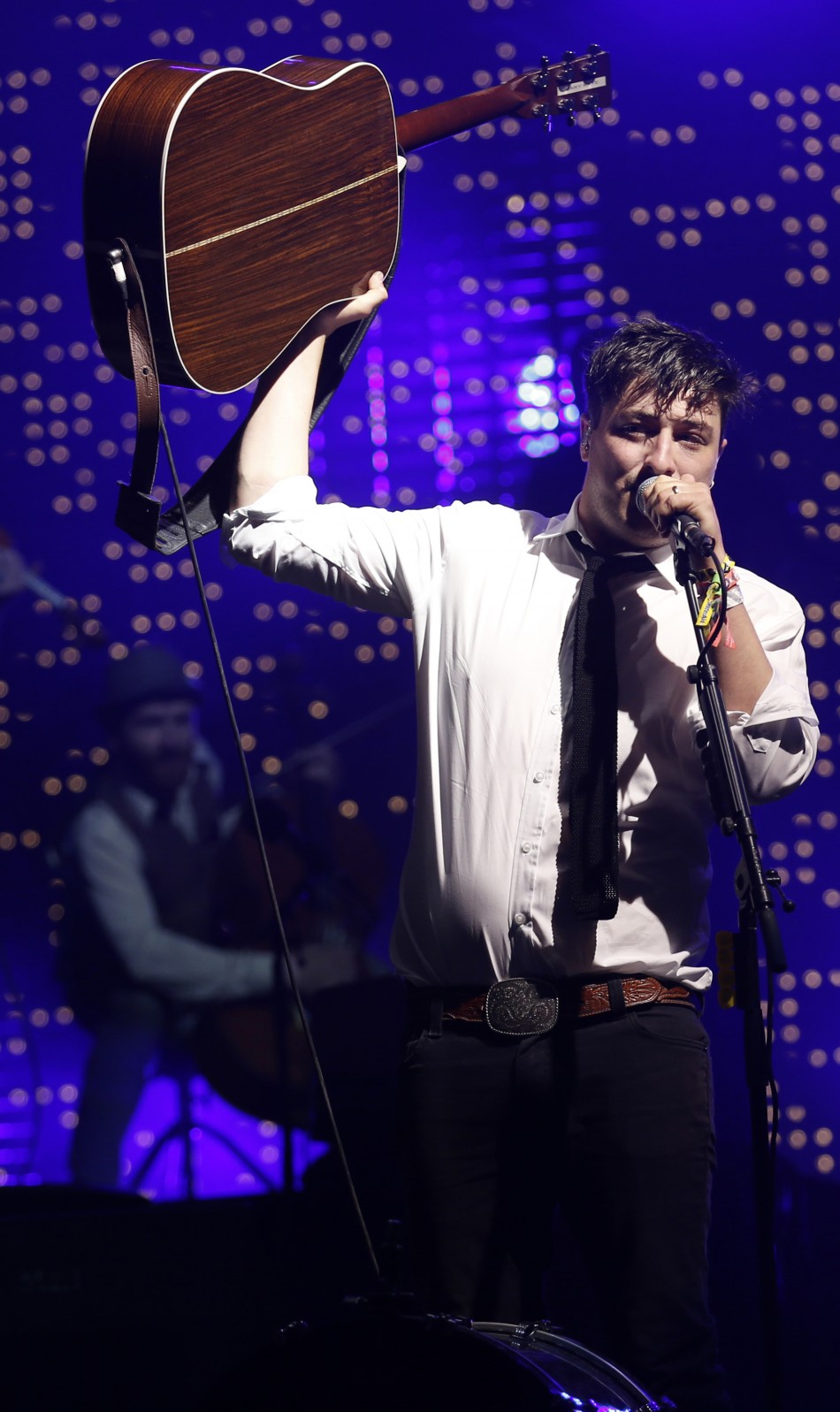 Marcus Mumford, lead singer of Mumford  Sons, performs on the Pyramid Stage at the Glastonbury music festival at Worthy Farm in Somerset, June 30, 2013.