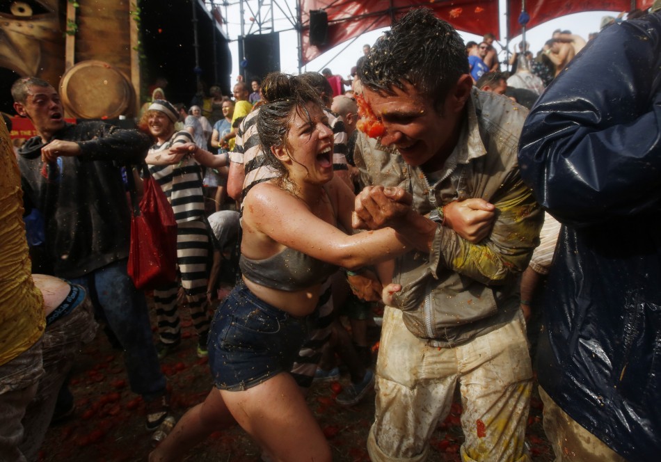 Revellers take part in a tomato fight