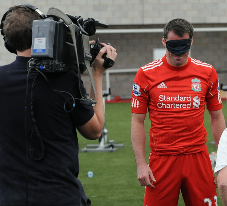 Liverpool Football Club players show support for Standard Chartered's Seeing is Believing charity (Photo: Standard Chartered)