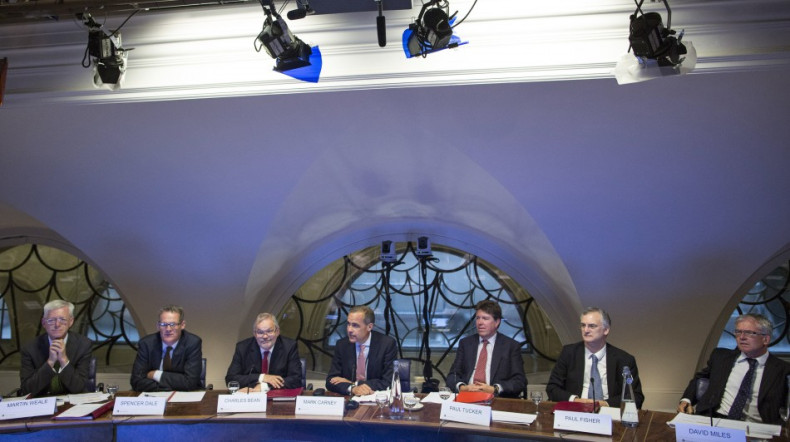 Mark Carney, the governor of the Bank of England (C), attends a monetary policy committee (MPC) briefing with (L-R) Martin Weale, a monetary policy committee member at the Bank of England, Spencer Dale, chief economist at the Bank of England, Charles Bean
