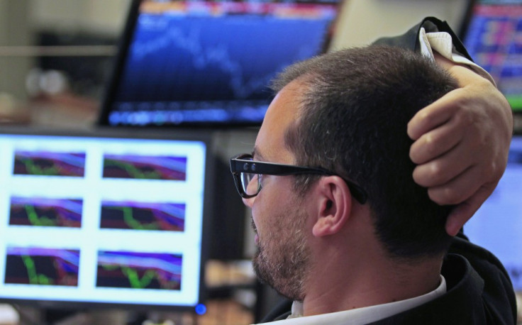 Trader watches the screens at a bank in Lisbon July 3, 2013. (Photo: Reuters)