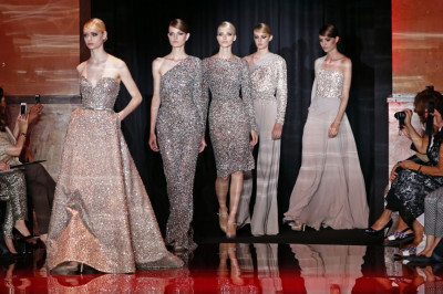 Models present creations by Lebanese designer Elie Saab as part of his Haute Couture Fall Winter 20132014 fashion show in Paris
