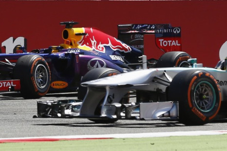 Sebastian Vettel [Red Bull Racing-Renault] (L) and Nico Rosberg [Mercedes F1]