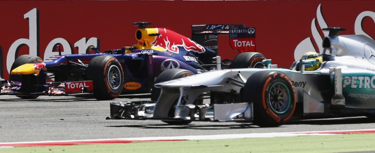 Sebastian Vettel [Red Bull Racing-Renault] (L) and Nico Rosberg [Mercedes F1]
